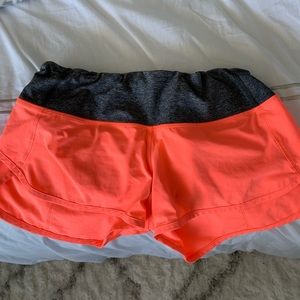 Coral Lululemon running shorts